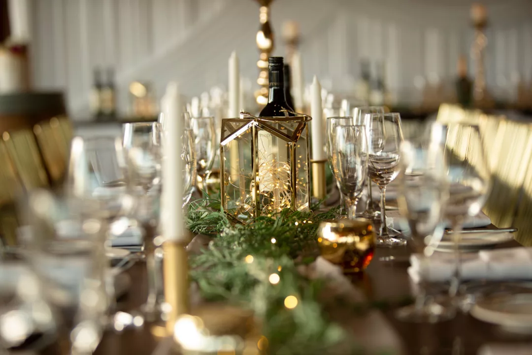 Table set for a wedding with gold decorations