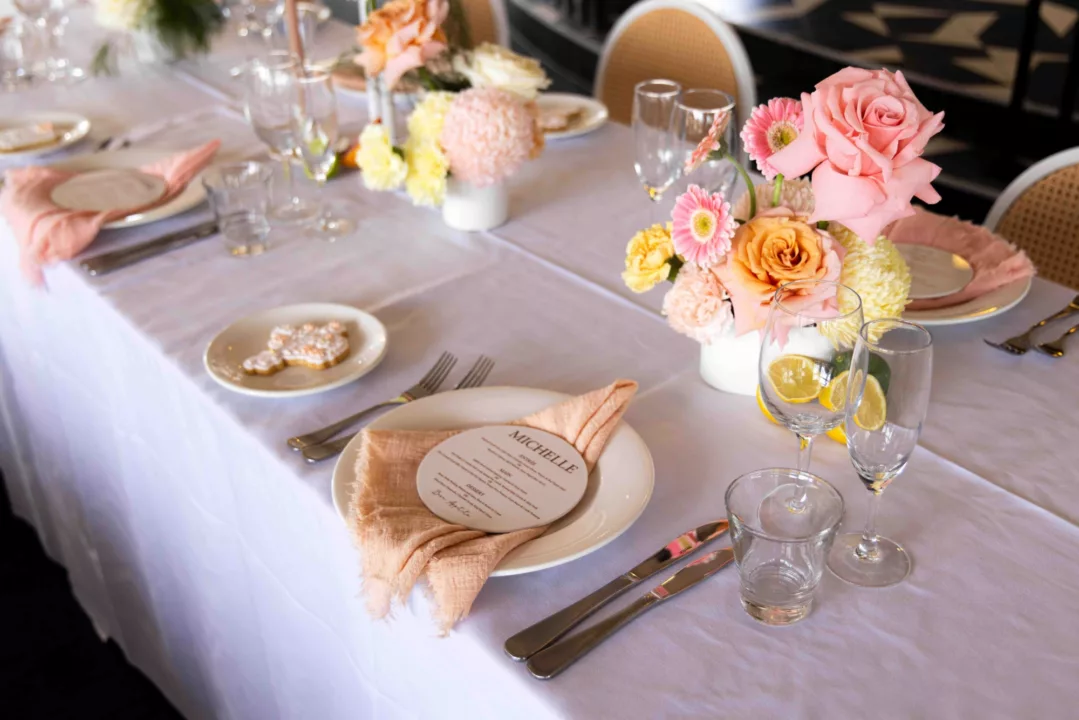 Wedding table with flowers, linen and placemats