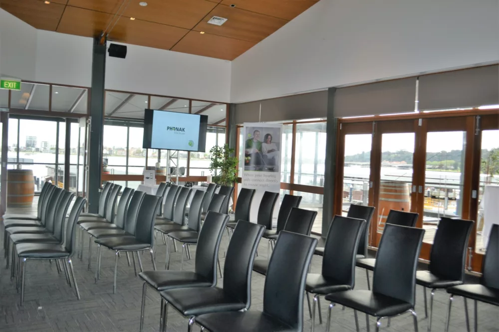 Corporate meeting venue room set up for a presentation