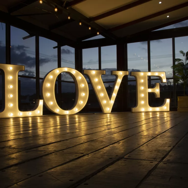 Large illuminated letters spelling out LOVE