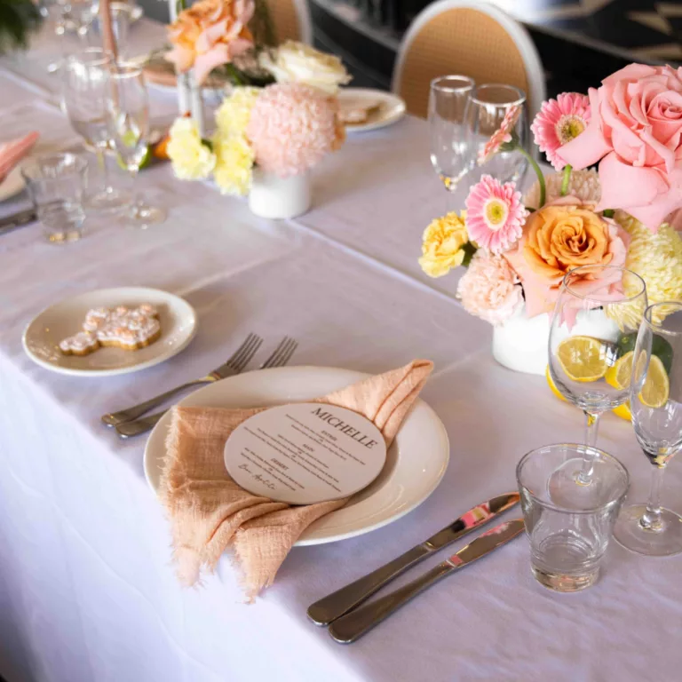 Wedding table with flowers, linen and placemats