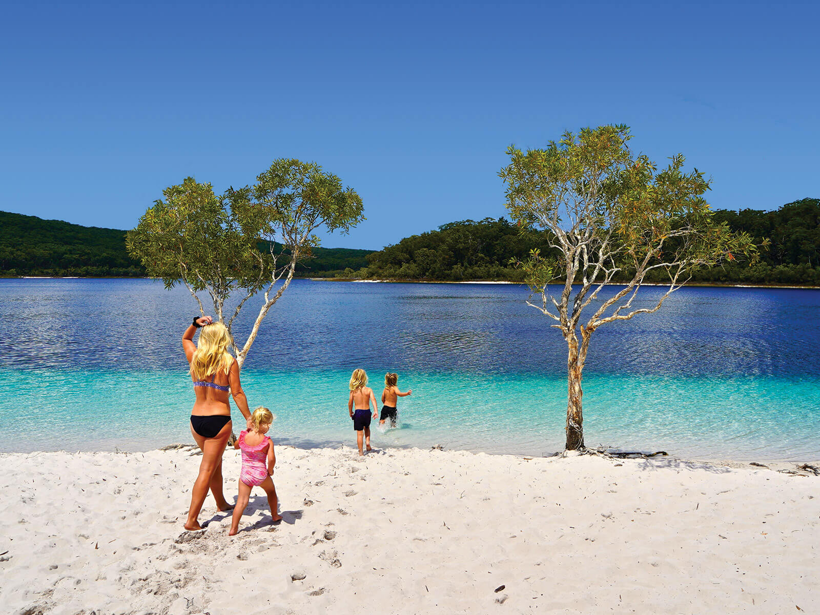 Family at Lake McKenzie, K'gari (formerly Fraser Island)