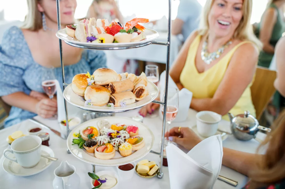 High Tea at Sea girls group women tiered platter food plates