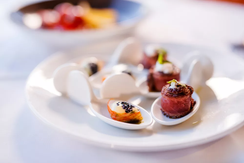 Gold canapés salmon beef food plate dining