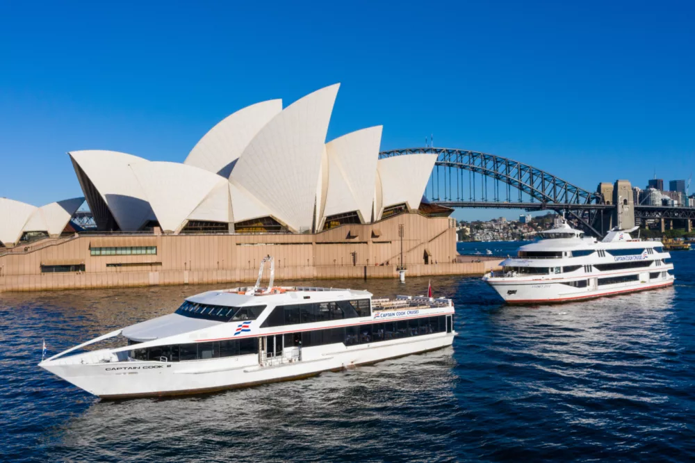 CC3 Captain Cook 3 and S2 Sydney 2000 boats aligned in front of Opera House during the day