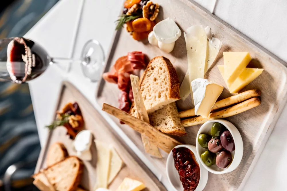 Cheese charcuterie board plate casual tapas bar food menu