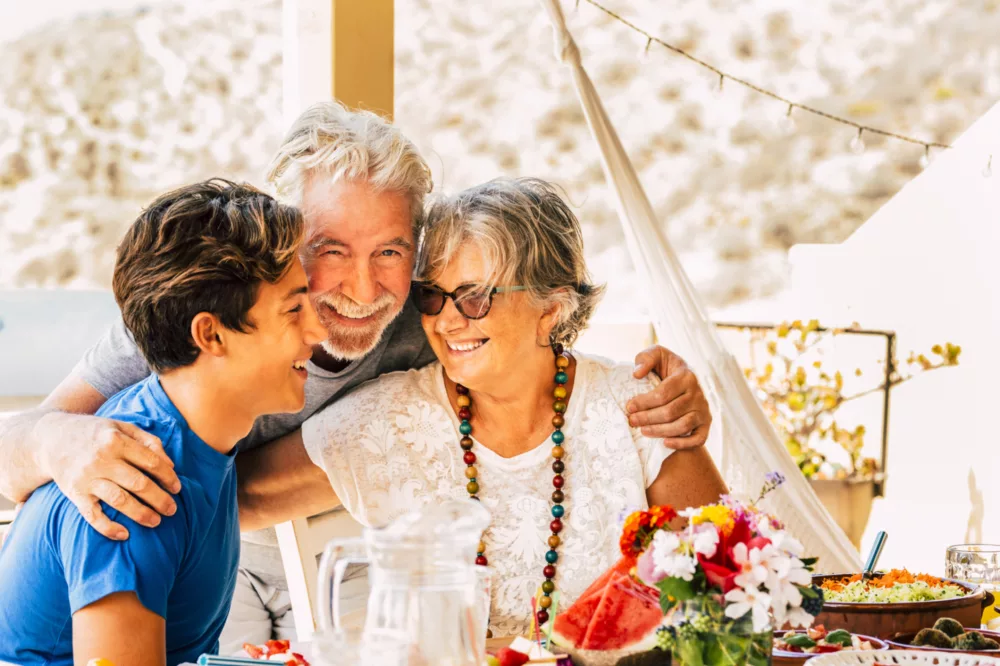 grandparents senior grandfather grandmother child son - stock