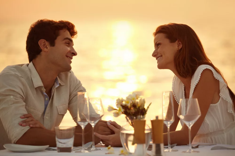 Couple on Water by Sunset