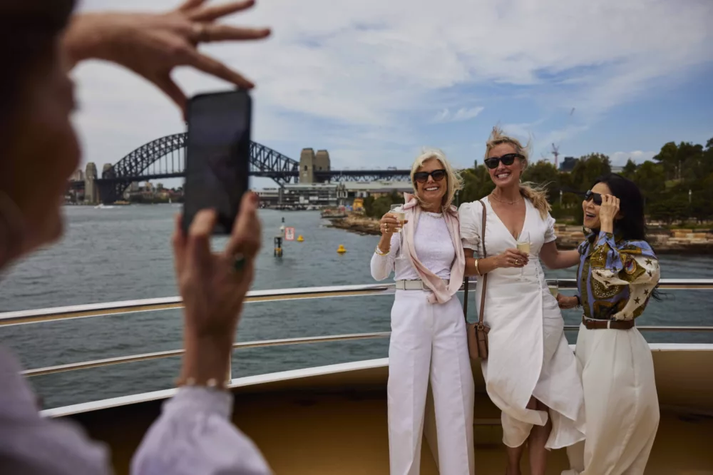 Group ladies photo daytime deck, harbour sightseeing, BB