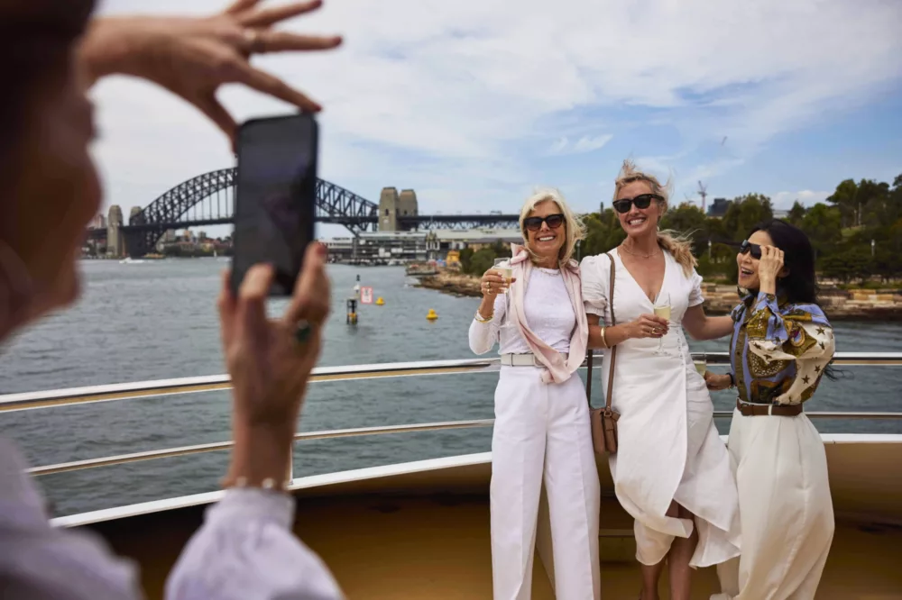 Group of ladies taking photo on deck - BB