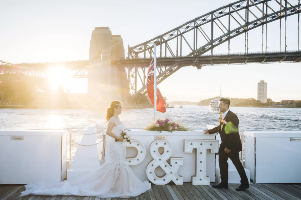 Wedding day charter with Harbour Bridge in the background with bridge and groom couple decoration non-ccc customer