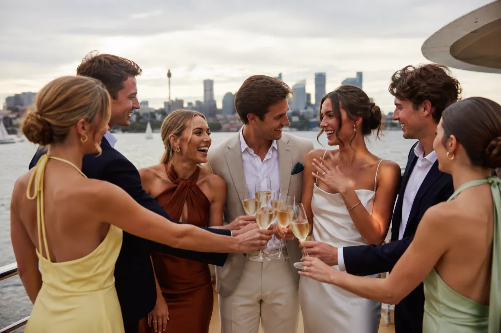 Outdoor cheers to the engaged couple