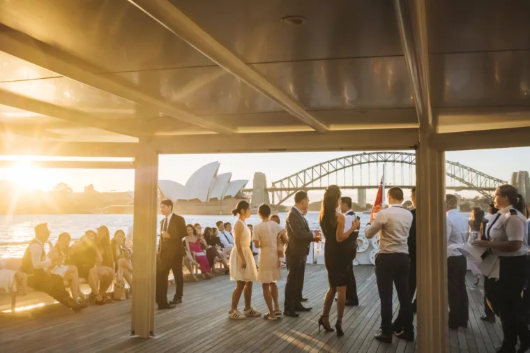 Captain Cook 3 boat CC3 wedding charter fleet event open deck at sunset