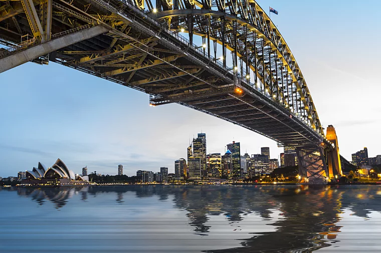 Cruising under the Sydney Harbour Bridge - Stock