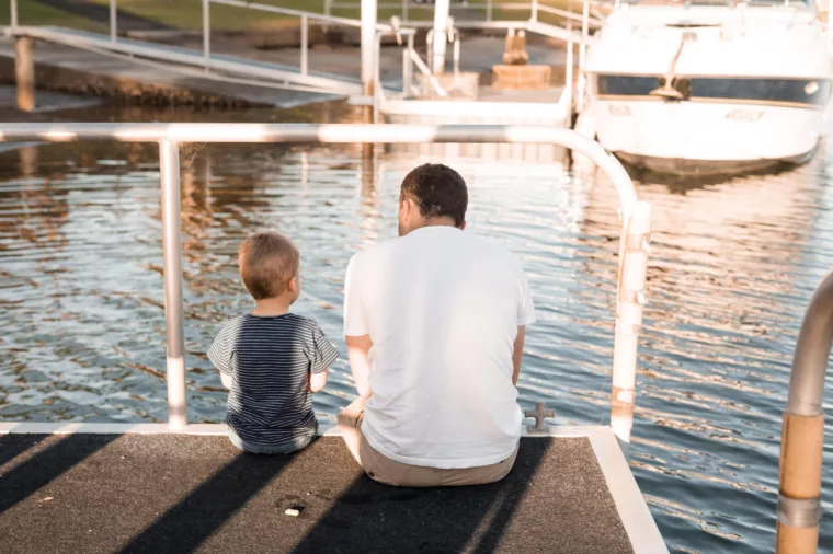 Dad and son family shot near the water Fathers Day special event non-ccc unsplash