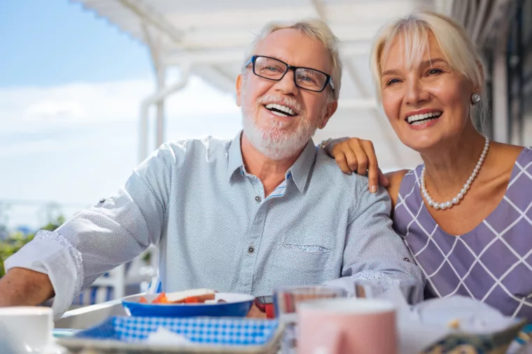 Senior couple having casual dining lunch and smiling bb non-ccc stock, BB