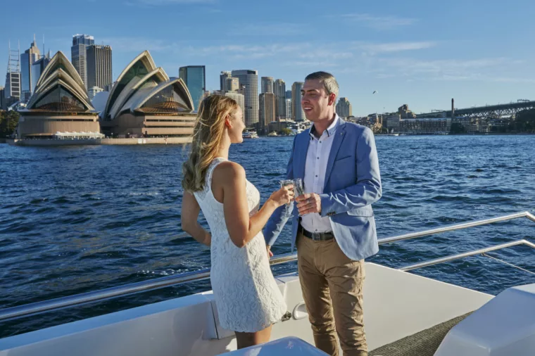 Romantic couple enjoying champagne and sightseeing from Sydney Crystal