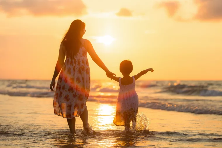 Child and Mother on Beach