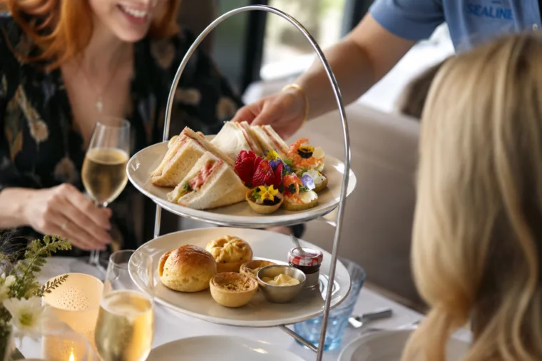 Afternoon tea gathering with champagne