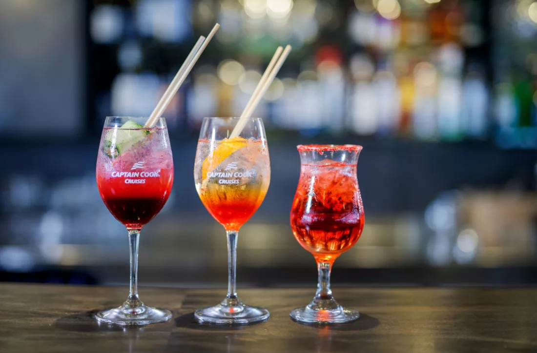 Cocktail drinks glasses on bar