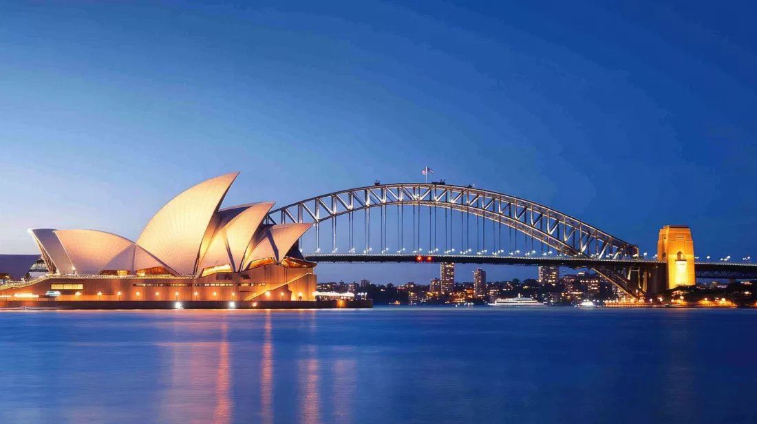 Sydney Harbour Bridge and Opera House illuminated by breathtaking fireworks, with no people visible, highlighting the serene atmosphere.