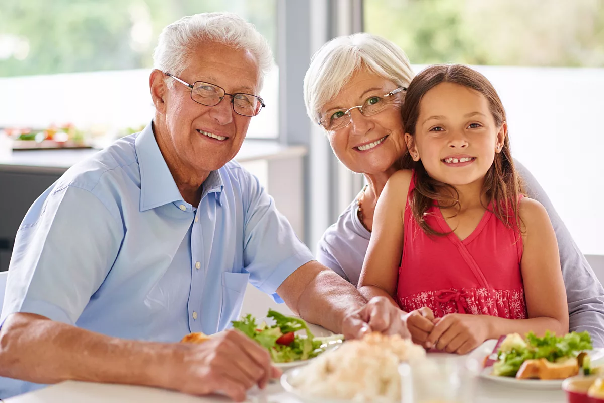 seniors grandparents grandfather grandmother child daughter - stock