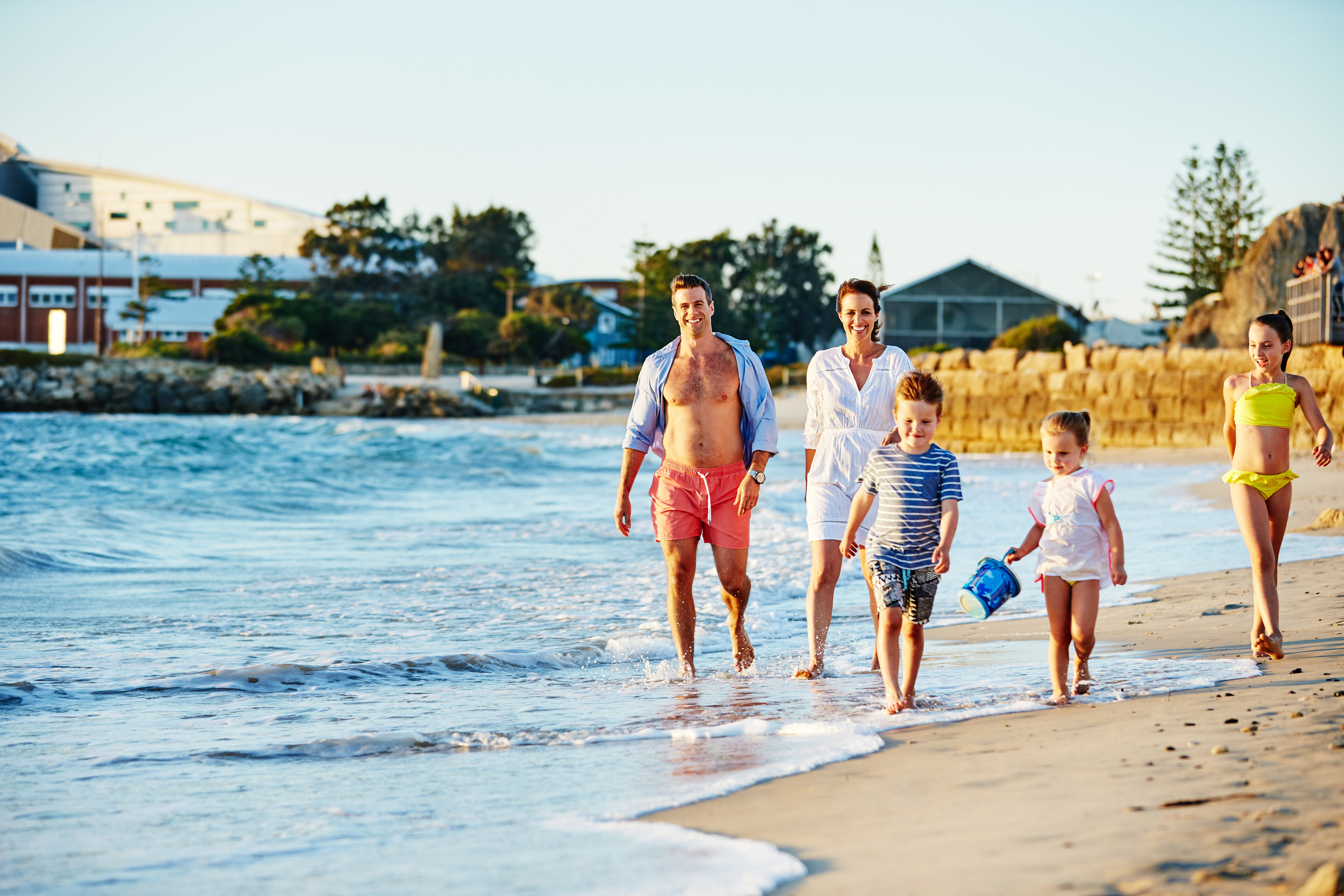 Family walking along Bathers Beach