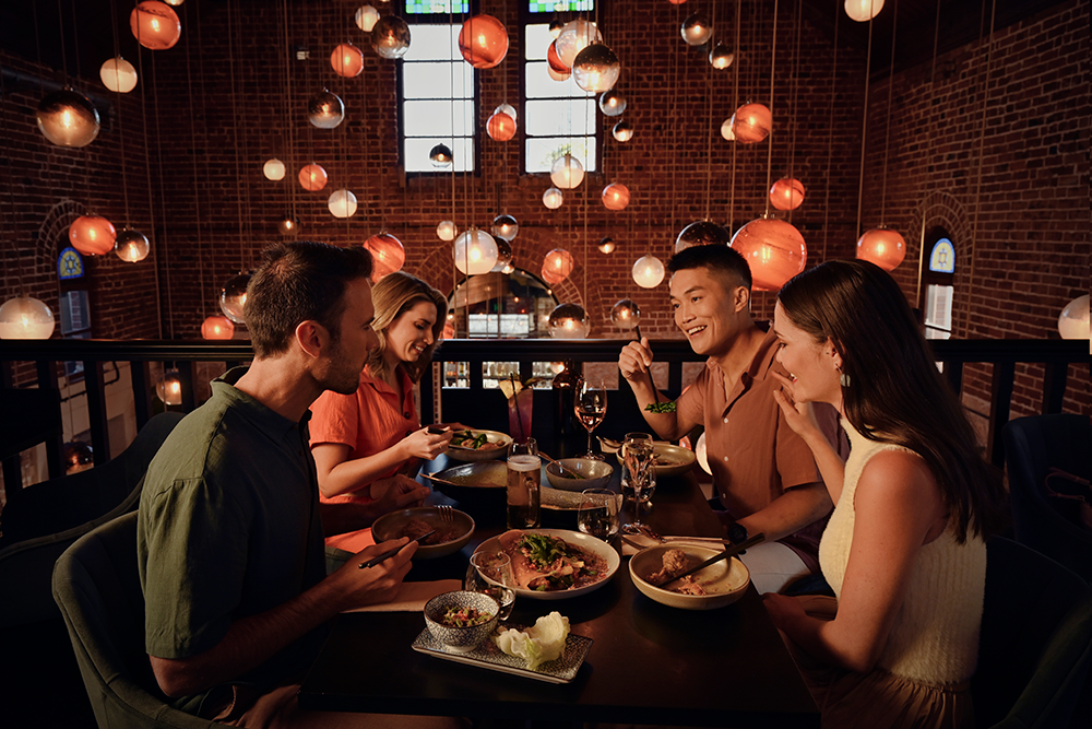 Group of friends eating at Tonic & Ginger