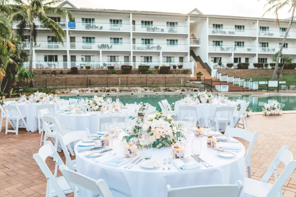 Wedding table decor by the pool at K'gari Beach Resort, K'gari (Fraser Island)