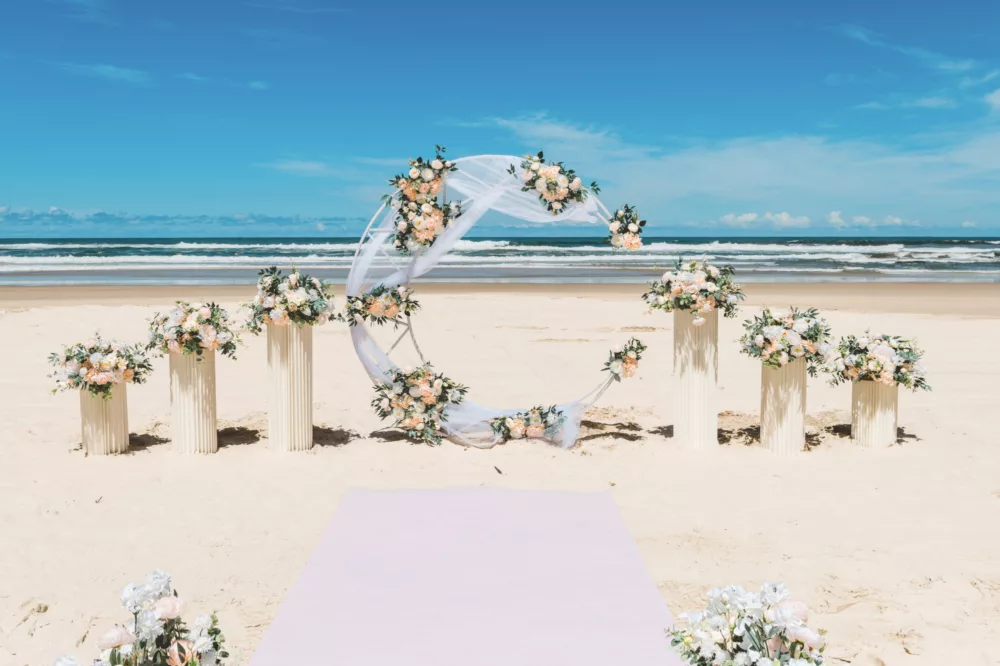 Wedding ceremony on the beach at K'gari Beach Resort, K'gari (Fraser Island)