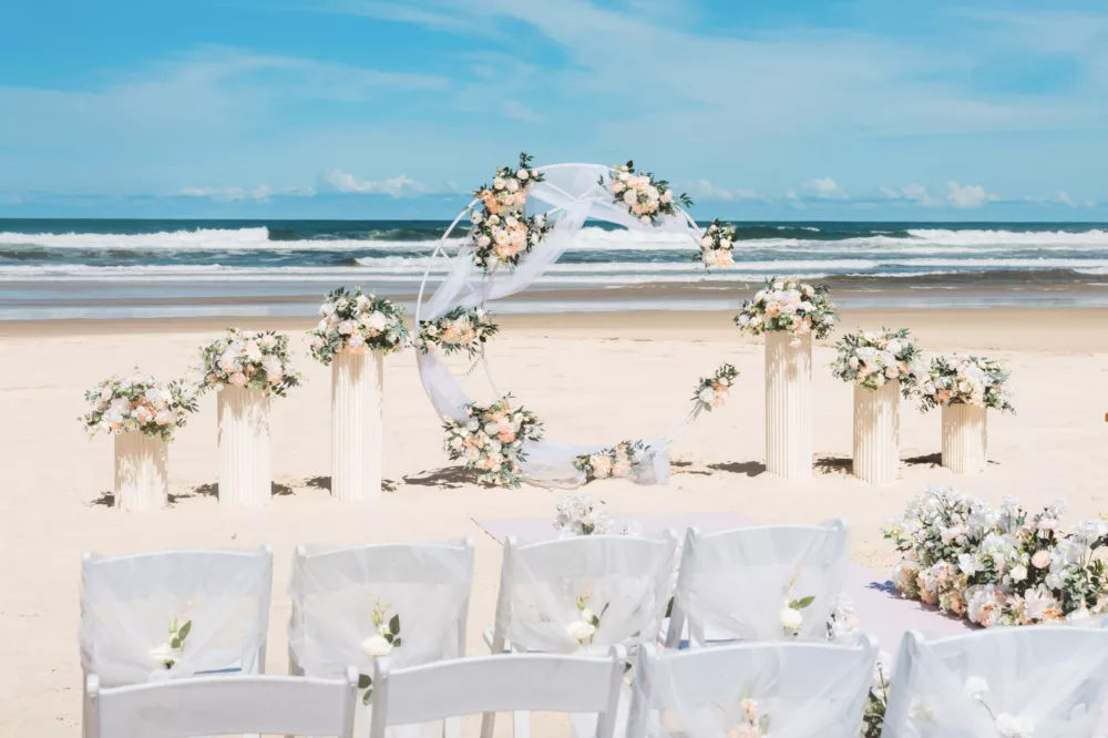 Wedding ceremony on the beach at K'gari Beach Resort, K'gari (Fraser Island)