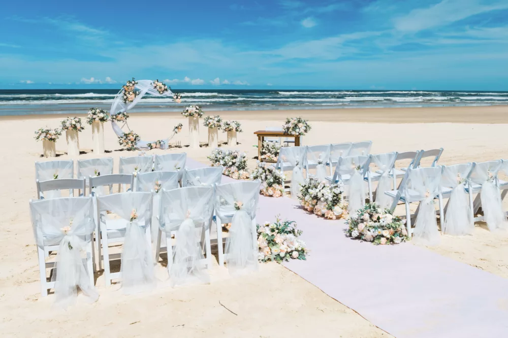 Wedding ceremony on the beach at K'gari Beach Resort, K'gari (Fraser Island)