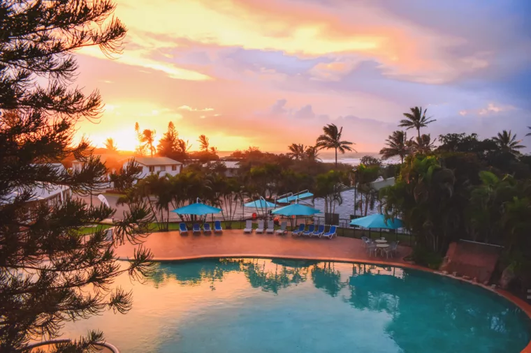 Sun rising over the pool at K'gari Beach Resort, K'gari (Fraser Island)