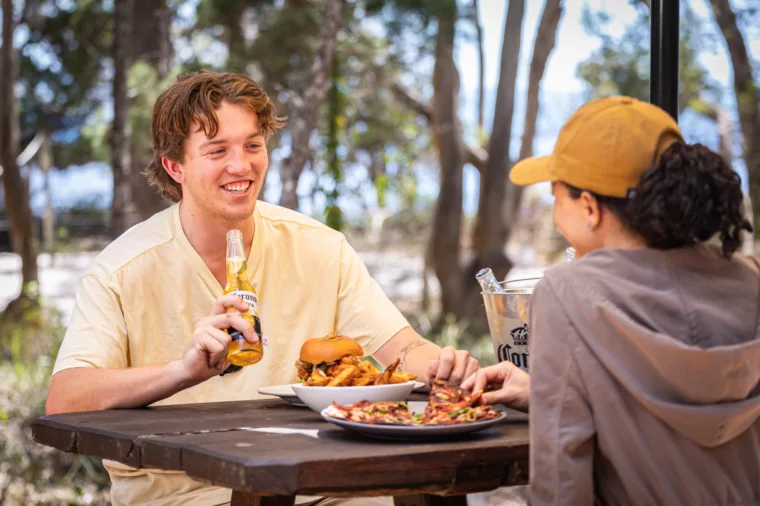 Couple dining at the Sand Bar & Bistro, Kingfisher Bay Resort