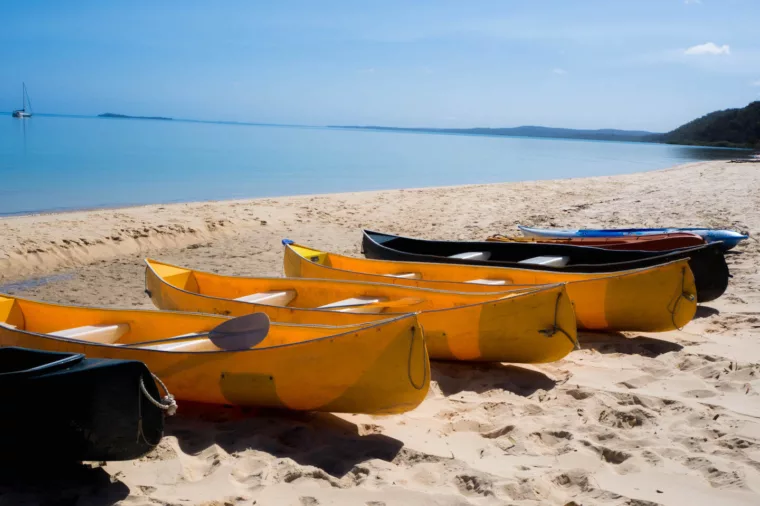 Canoes on the western beach at Kingfisher Bay Resort, K'gari (Fraser Island)
