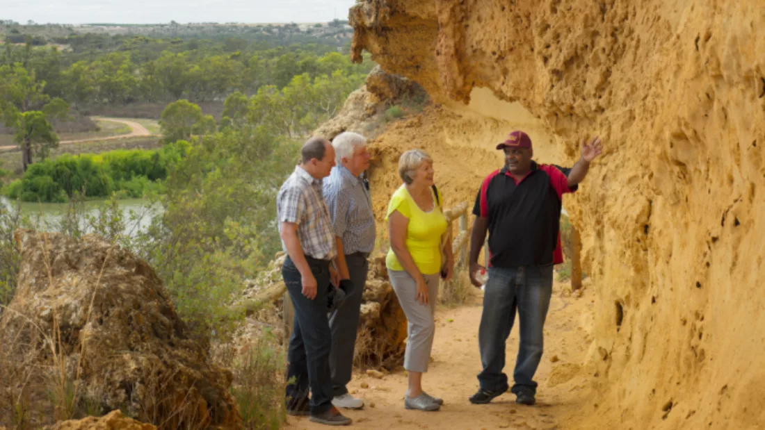 Guide with a group of people on a cultural tour