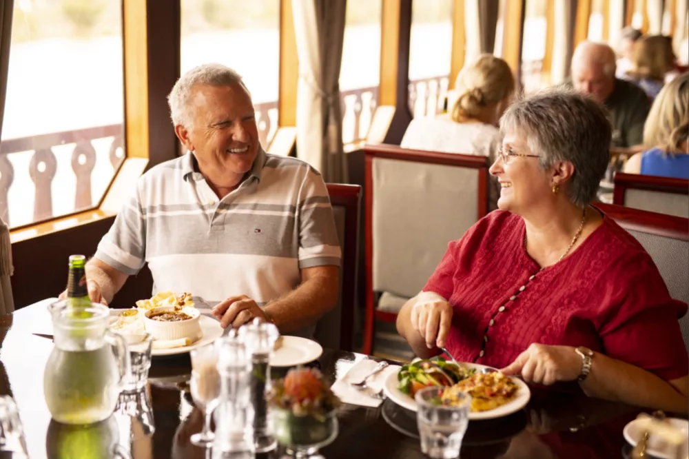 Couple enjoying a meal in the dining room