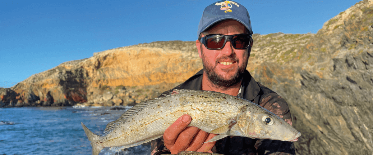 Adam Christie with some beautiful King George whiting caught from the rocky headlands alongside Emu Bay