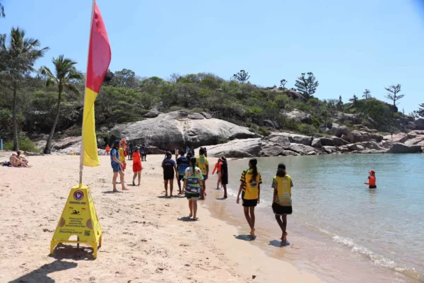 NRL Cowboys House Students on the beach