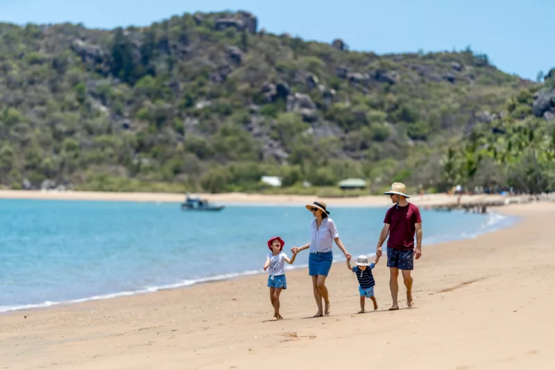 Image showcasing a full family exploring Magnetic Island together.
