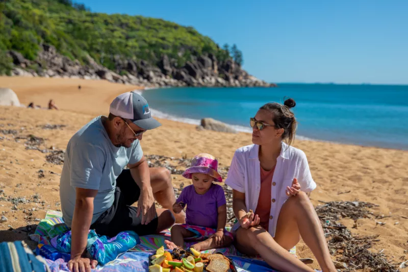 Family on the beach - courtesy of Tourism & Events Queensland