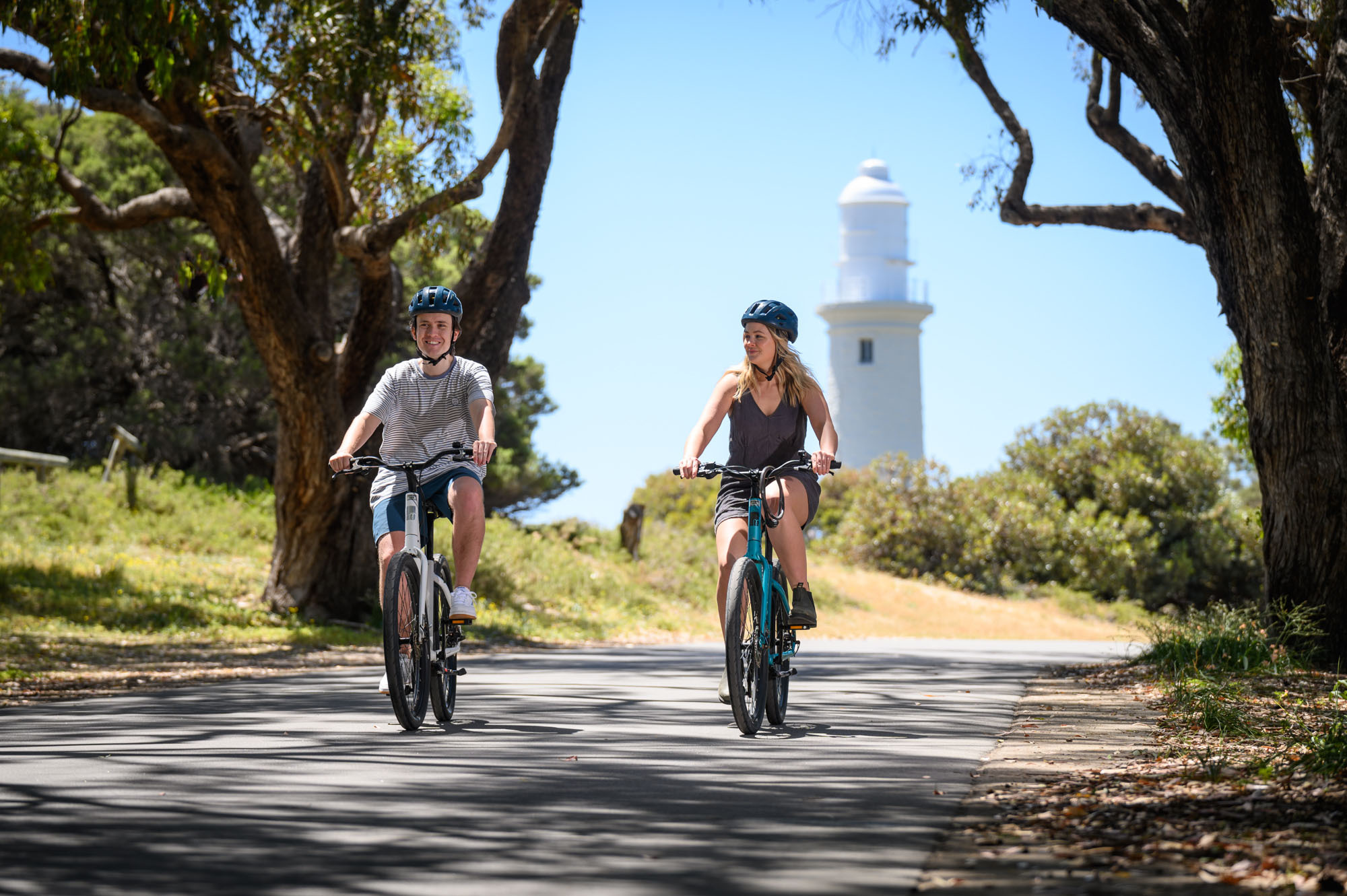 Friends riding bikes on the inland bike roads of Rottnest Island