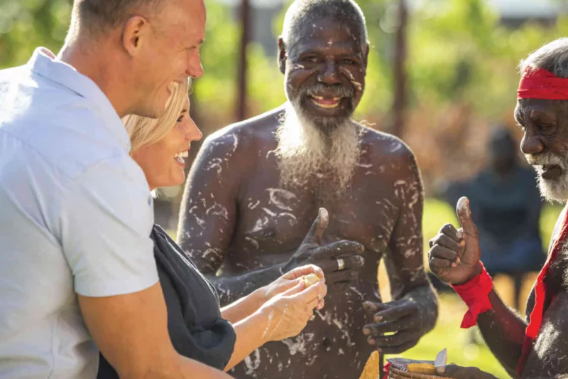 Travellers interact with Tiwi Islands locals