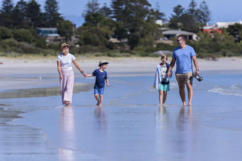 Family at the beach at Frenchman Rocks