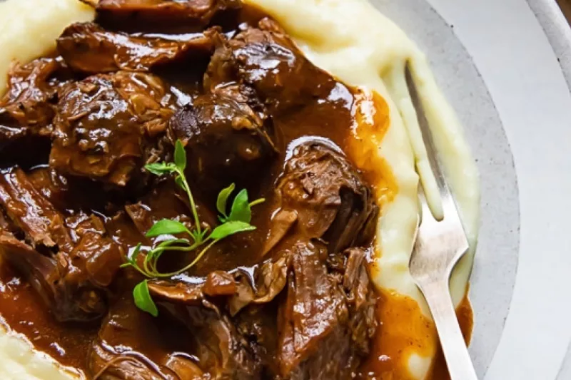 Lamb with red wine sauce dish