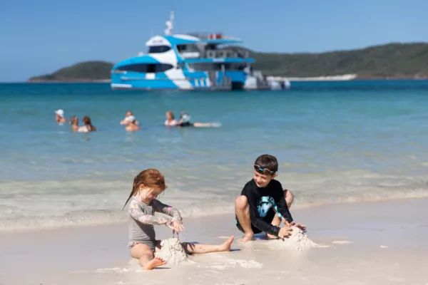 Purely Whitehaven Beach Day Tour Kids building sandcastles
