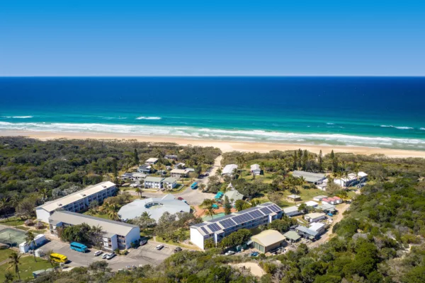Aerial shot of K'gari Beach Resort showing the resort's beachfront location.