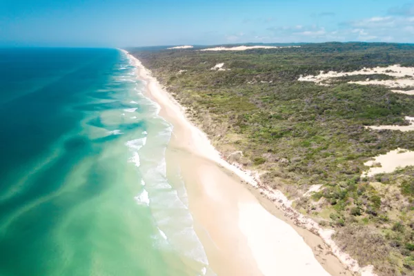 Drone shot of 75 Mile Beach on K'gari (formerly Fraser Island).