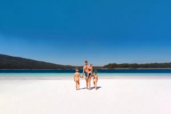 A mother with two children at Lake McKenzie