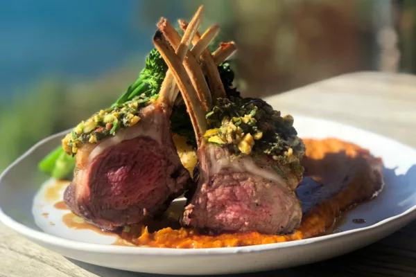 A dish of lamb rack on a table